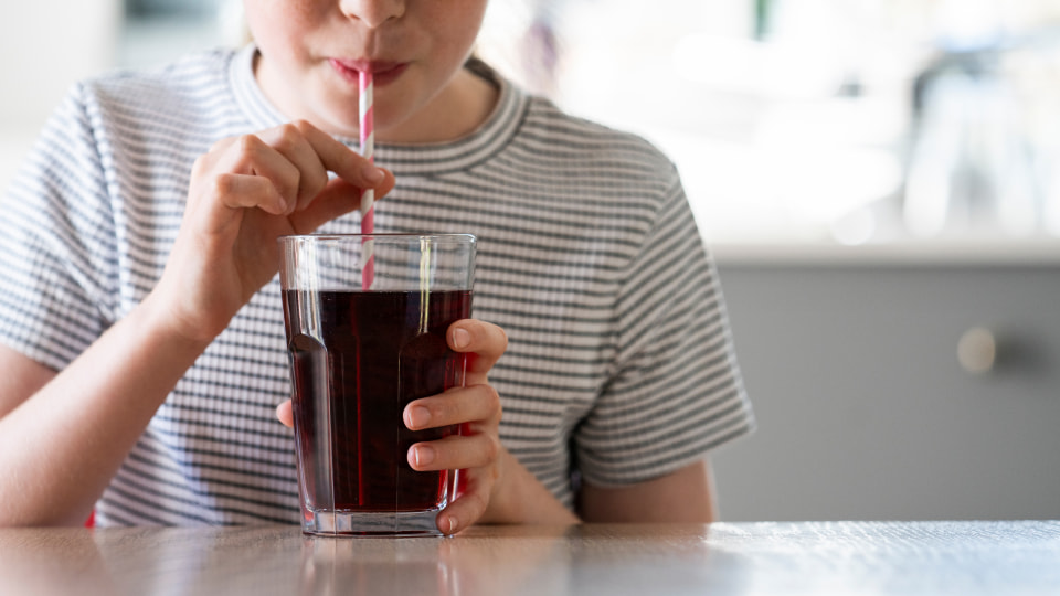 Girl drinking cola